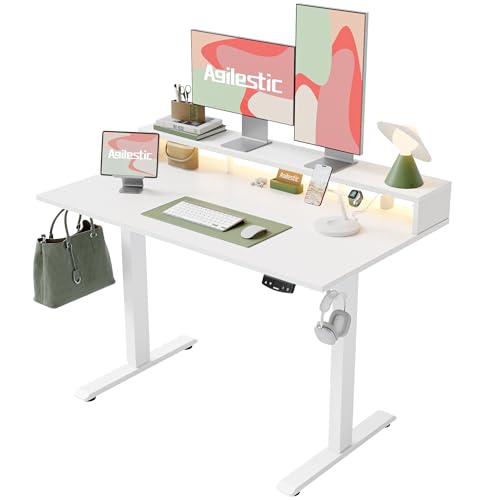Agilestic 48 x 24 inch white electric standing desk with monitor shelf and LED light